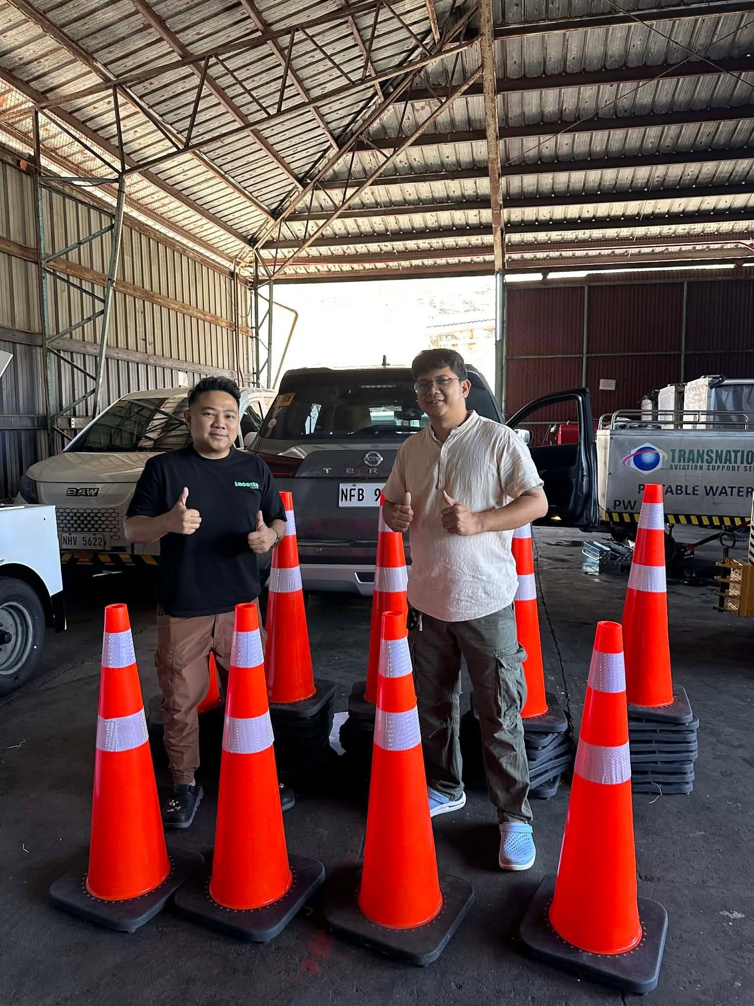 JSIXRON team delivering traffic safety cones to an aviation ground support client