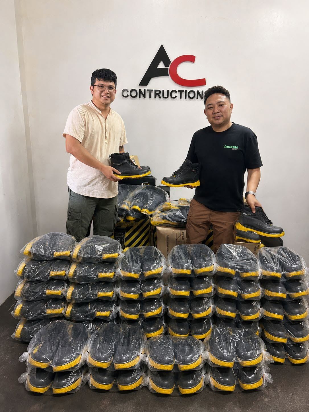 JSIXRON team delivering safety boots and PPE stock to a construction client